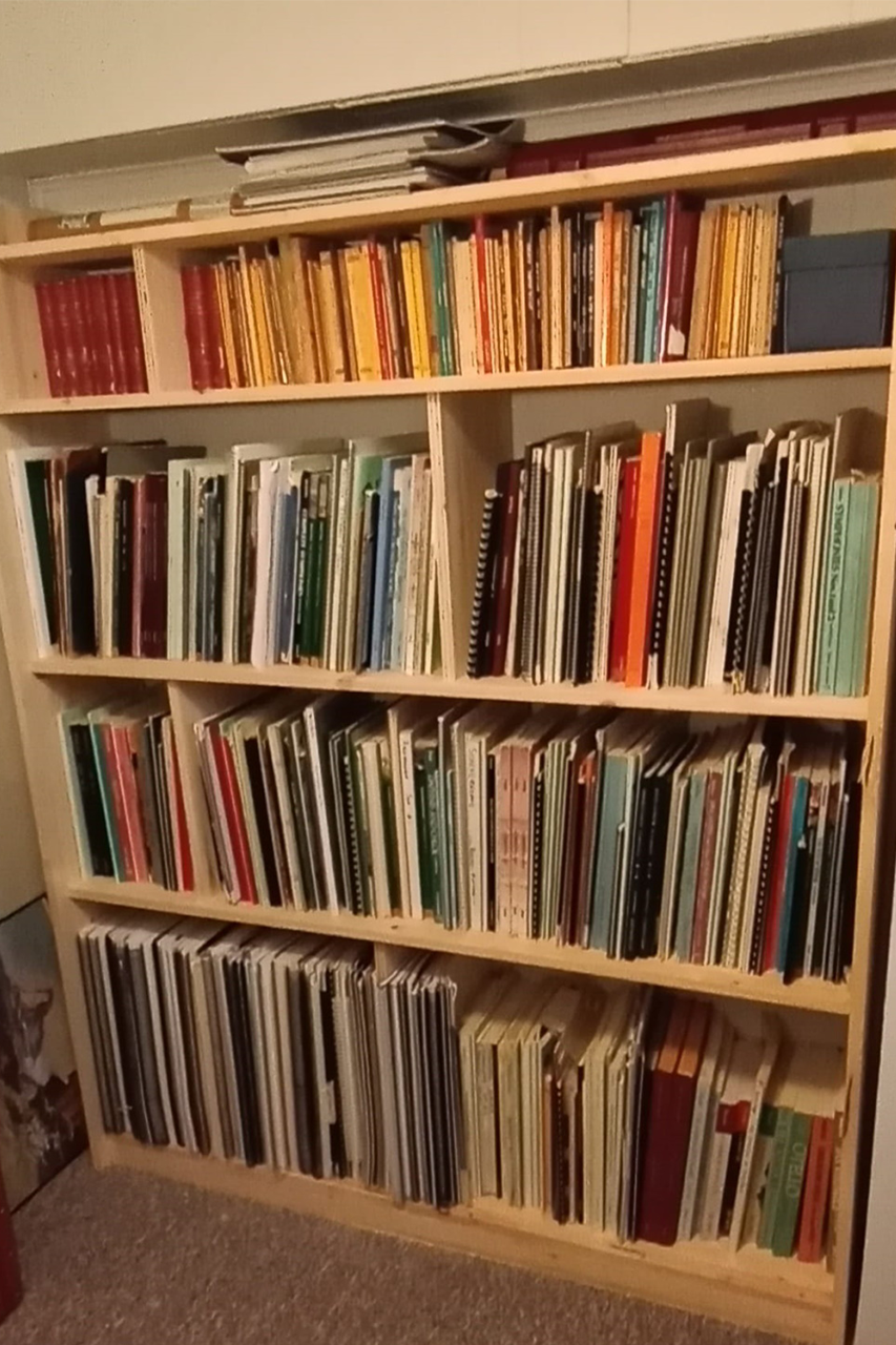 Bookcase completed with all the client's books.